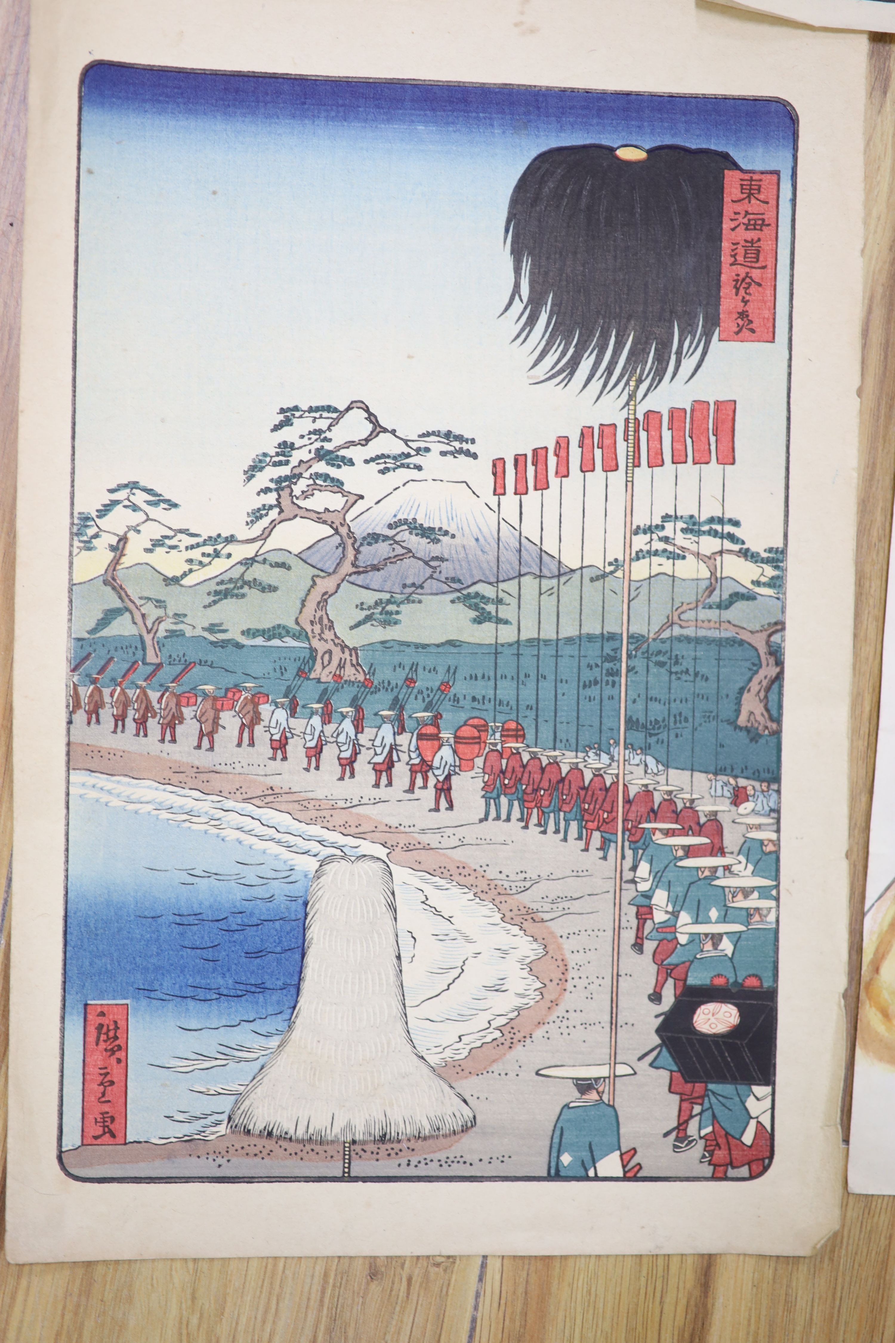 Japanese School, three woodblock prints, Warriors before Mount Fuji and other scenes, together with a watercolour of a cat, largest 38 x 25cm, unframed